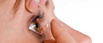 girl inserts lens into eye