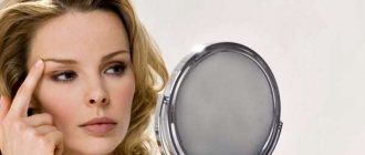 Woman looking in the mirror